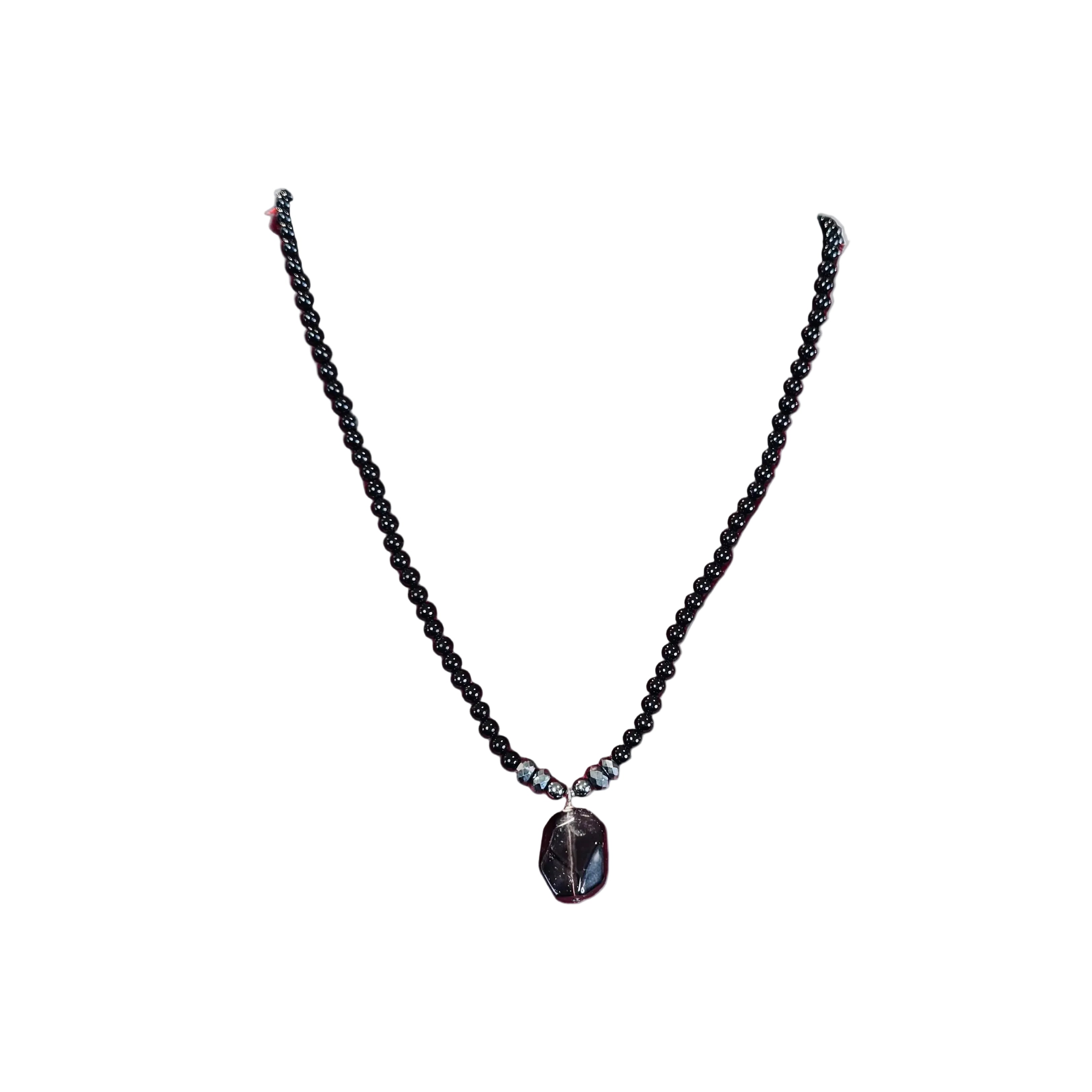 Black beaded Necklace with a Smokey quartz pendant on a white background